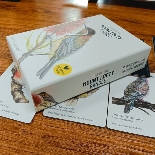 Birds of the Mount Lofty Ranges memory card game box with illustrated cards fanned out on a timber table